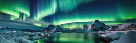 Dazzling Display Of The Aurora Borealis Above Frozen Fjord With Icebergs Floating In The Water. Panoramic bannerの素材