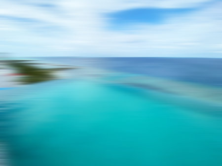 Seascape landscape with turquoise sea. Blurred motion. Copy space. Light blue background.の写真素材