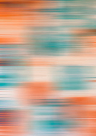 Orange and turquoise spots on a beige background in blurred motion
