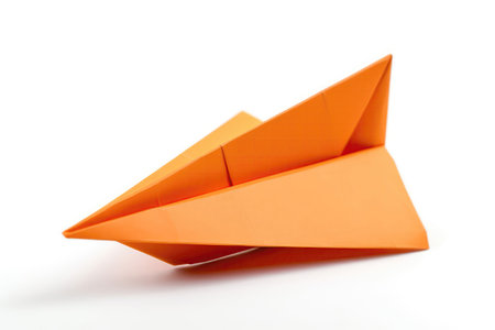 Orange Paper Airplane On White Backgroundの素材