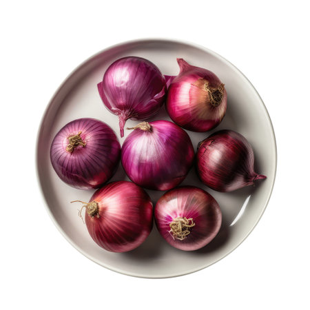 Raw Red Onions On White Plate, On White Background.の素材
