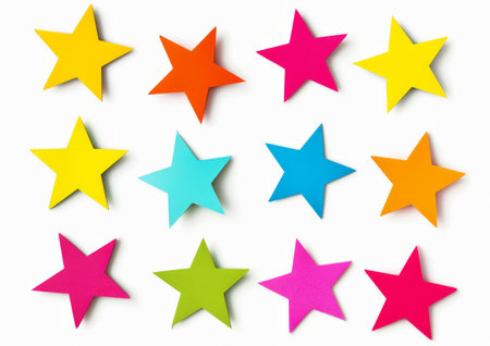 Collection Of Vibrant, Starshaped Paper Stickers Perfectly Isolated On White Backgroundの素材
