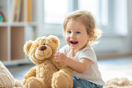 Adorable Child Happily Interacting With Teddy Bear During Playtime. Ð¡oncept Cute Kid And Teddy Bear, Heartwarming Playtime, Sweet Moments, Joyful Interactionsの素材