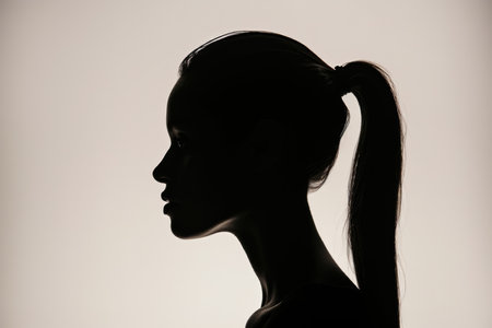 Stylish Woman's Silhouette With A Ponytail Hairstyleの素材