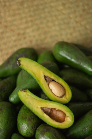 Avocado fruit on sackcloth background, Healthy food and diet concept.の写真素材