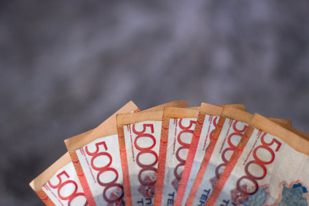 Close up of banknotes of 50 and 100 rubles on gray background
