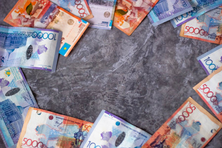 Ukrainian hryvnia banknotes on a marble background