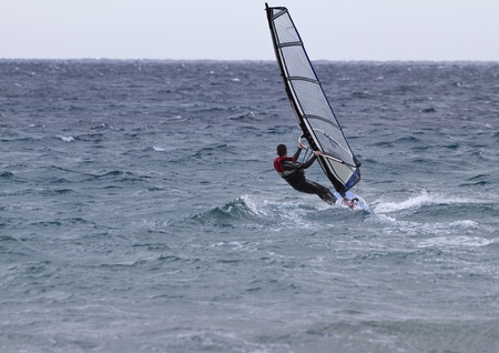 windsurfing on the open seaの写真素材