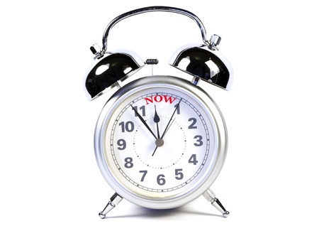 photo of a retro alarm clock in white backgroundの写真素材