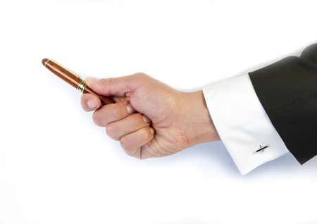 photo of a hand holding a  luxury penの写真素材