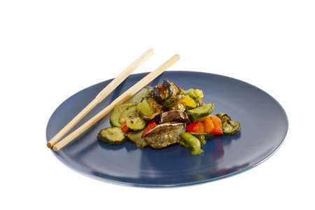 photo of chopsticks and mixed grilled vegetablesの写真素材