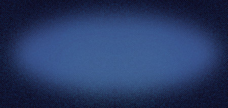 Blue denim background with a light spot.
