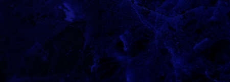 Abstract dark blue stone background. Background for printing and sites. Empty space to insert text and other graphic elements.の写真素材