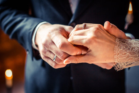 Married couple hands with rings