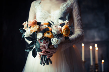Bride holding flower bouquet