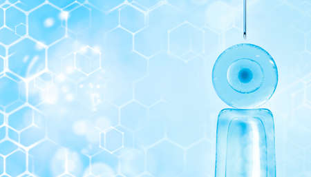 3d illustration of in vitro fertilization under a microscope. egg, medical needle, test tube, pipette. Beautiful medical banner in blue tones with a blurred background with highlights and texture. Close-up, microscope, reprudoctology, IVF advertising with left copy spaceの写真素材