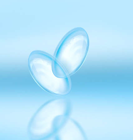 Realistic eye contact lenses 3d Illustration advertising banner template. 3d eye lenses. Close up clear lenses on blue background.Vision product ad.Silicone hydrogel.Side view.Optic eyewear.の写真素材
