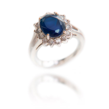 A ring with dark blue sapphires . A ring with flowers. Jewelry design .の写真素材