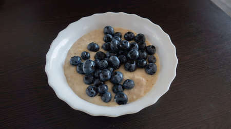 Blueberry tartlet top view. Dessert with fresh berriesの写真素材