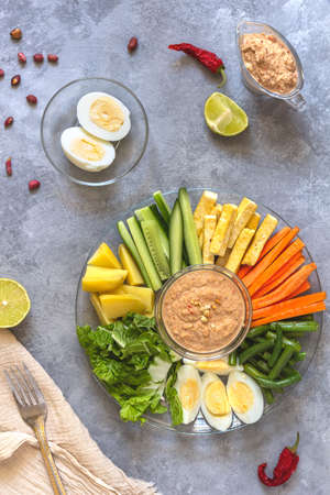Flat lay with gado-gado salad on a gray backgroundの写真素材