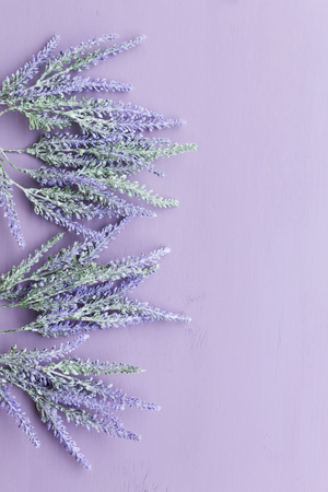 Lavender flower on purple wooden background.の写真素材