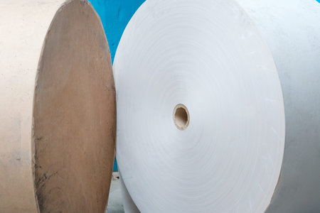 Spools of white paper in poligraphy ready to print.