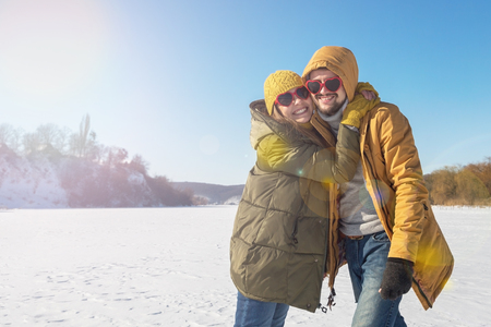 Couple in love on a winter sunny day. Top wiev.の写真素材
