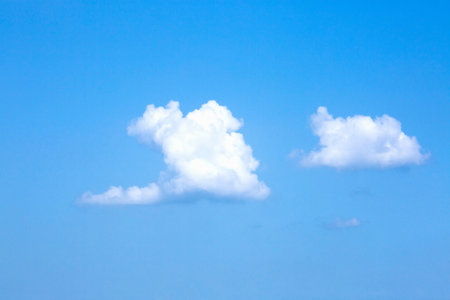 Clear blue sky with white clouds