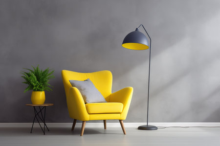 Yellow armchair with pillows and floor lamp on gray wall backgroundの素材