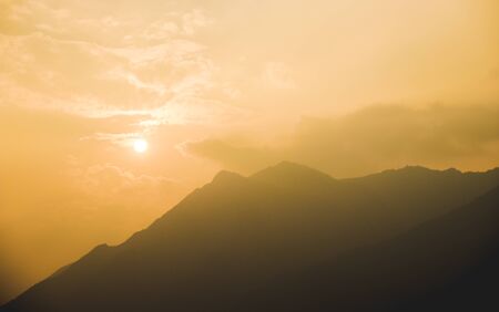 Beautiful sunset of Lake Como at the promenade of Lecco, a small lakeside commune situated at the foothills of the Bergamo Alps in North Italy, Lombardy region. Near sights: Bergamo, Milan, Lake Iseoの写真素材