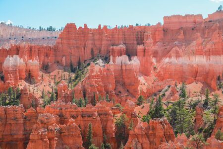 Beautiful Bryce Canyon National Park in Utah, USA. Orange rocks, blue sky. Giant natural amphitheaters and hoodoos formations. Great panoramic views from vista points and breathtaking adventure.の写真素材