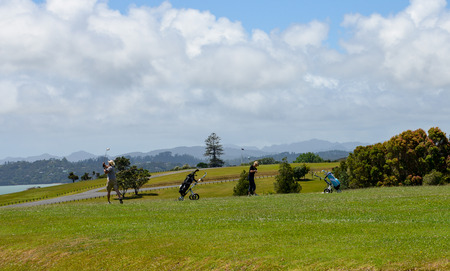 People playing golf in Waitangi Nature Reserveのeditorial素材