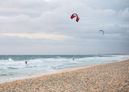 Two men kitesurfing on the beach in Indian ocean in Perth Western Australiaのeditorial素材