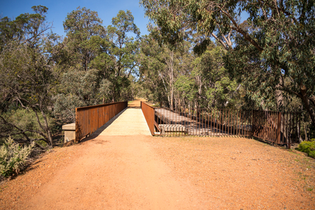 An old and a new pedestrian walking bridge in John Forrest National Park, Westerna Australiaの写真素材