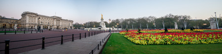 Square panorama with Queen Victoria memorial and flower-beds in front of Buckingam Palace, London, Englandのeditorial素材
