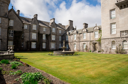 Grass lawn and a fountain in Balmoral Castle, Aberdeenshire, Scotlandのeditorial素材