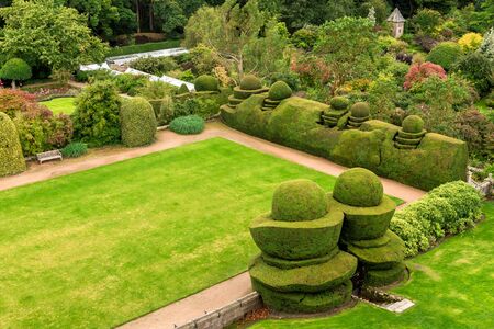 A view to a well maintained landscaped garden from one of the rooms in Crathes Castle, Aberdeenshore, Scotlandのeditorial素材
