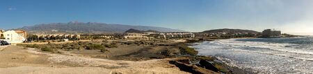Panorama of Playa del Cabezo beach with holiday and vacation houses nearby, El Medano, Tenerife, Spainのeditorial素材