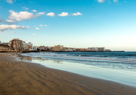 A view of El Medano town from Playa Leocadio Machado beach early in the morning, Tenerife, Spain