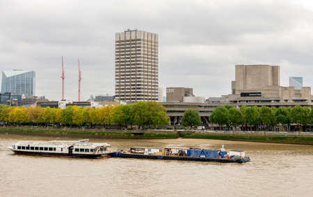 A view of Thames river and National Theatre building in poor autumn day in Londonのeditorial素材
