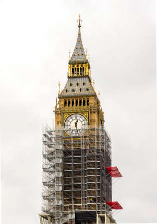 Big Ben tower covered with scaffolding for restoration, London, Englandのeditorial素材