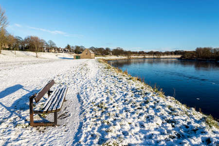 Seaton park central alley and St Machar's Cathedral covered by snow in winter season, Aberdeen, Scotlandの写真素材