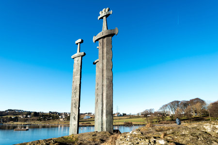 A view of Sword in Rock monument on the sea coast of Hafrsfjord fjord in a nice sunny winter day,...