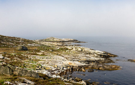 Walk path with a fence at scenic Sjobadet Myklebust public sea swimming pool in Tananger, Norway, May 2018の写真素材