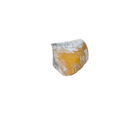 A small square piece of spoiled hard cheese with green and white mold on it. Isolated on a white background.の写真素材