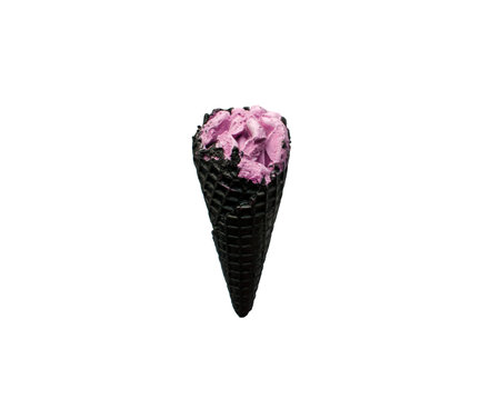 Pink ice cream in black horn isolated on a white background. Close up macro coal ice cream cone with soft dairy violet ball.の写真素材