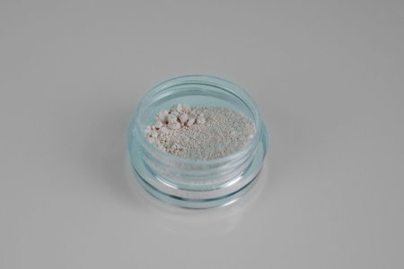 Isolated on light background makeup beauty cosmetics product & facial cosmetic, colorless mineral...
