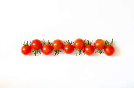Cherry tomatoes isolated on a white background. Close-up. Copy space.の写真素材