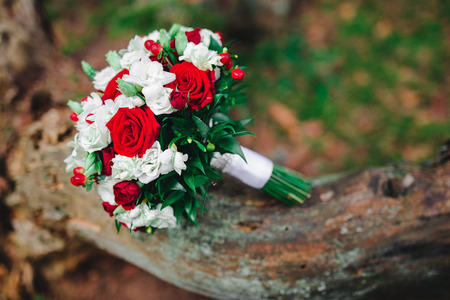 wedding bouquet with white and red flowersの写真素材