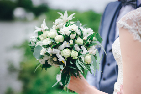 wedding bouquet in hands of the brideの写真素材